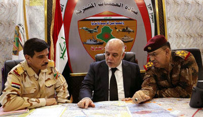 القوات الامنية وابطال الحشد الشعبي يقتلون خمسة وعشرين انتحاريا في سامراء (تقرير صوتي)