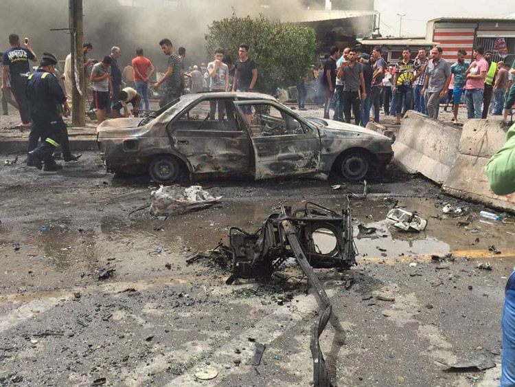 الحصيلة النهائية لتفجير منطقة بغداد الجديدة شرق العاصمة بغداد (مصور)