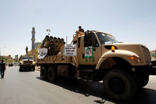استعراض عسكري في بغداد للقوات الامنية وابناء الحشد الشعبي
